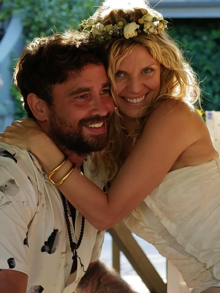 Annalynne McCord smiling and hugging Danny Cipriani, who is also smiling.
