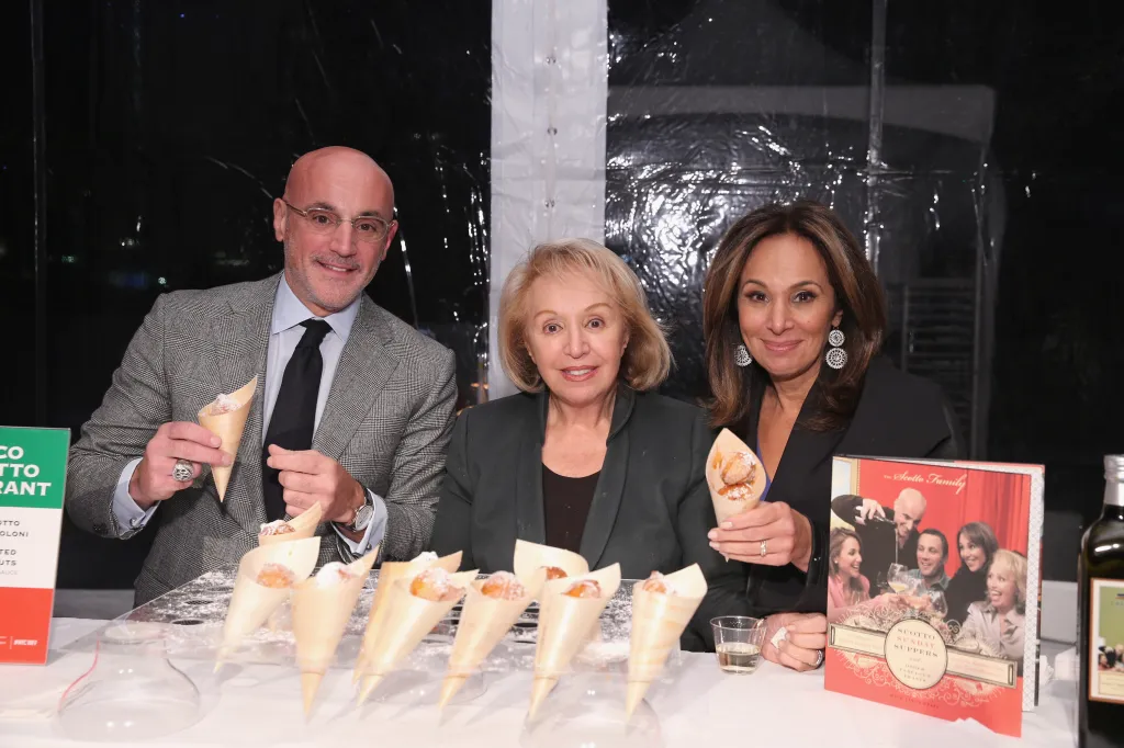 Anthony Scotto Jr., Marion Scotto, and Rosanna Scotto pose at the Scotto Sunday Suppers station at Giada De Laurentiis' Italian Feast.