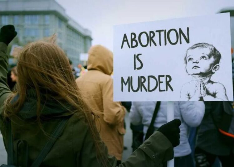 GOP sneaks abortion ban into right-wing culture-war fight