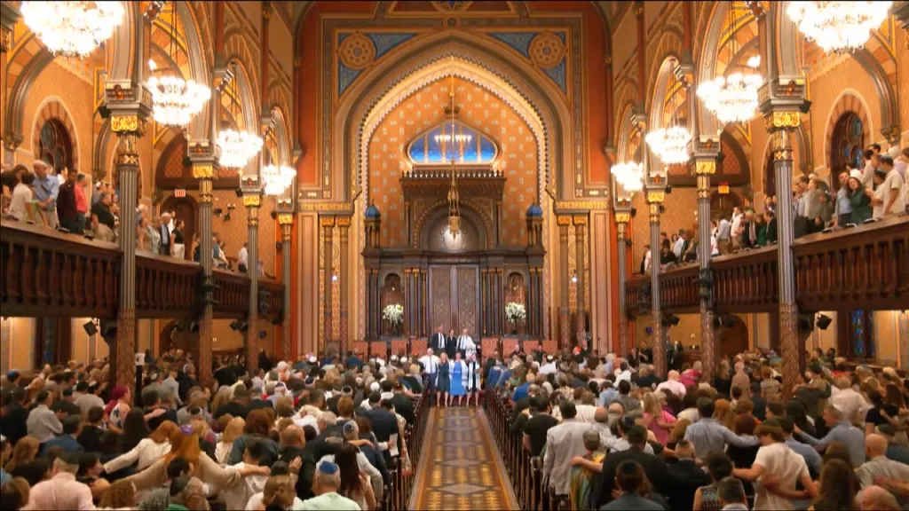 A Friday night service at the Central Synagogue with a large congregation.