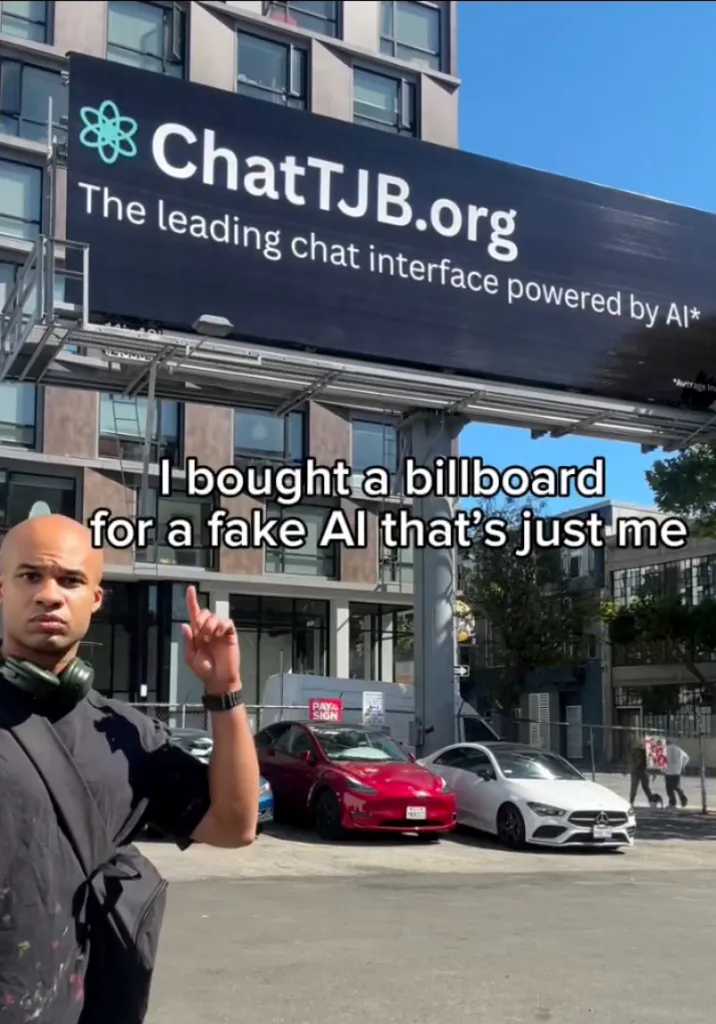 A man points to a billboard that reads 