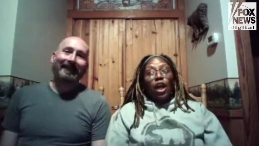Victoria Puyol and Joshua Card reacting to a bear entering The Spice & Tea Exchange of Gatlinburg.