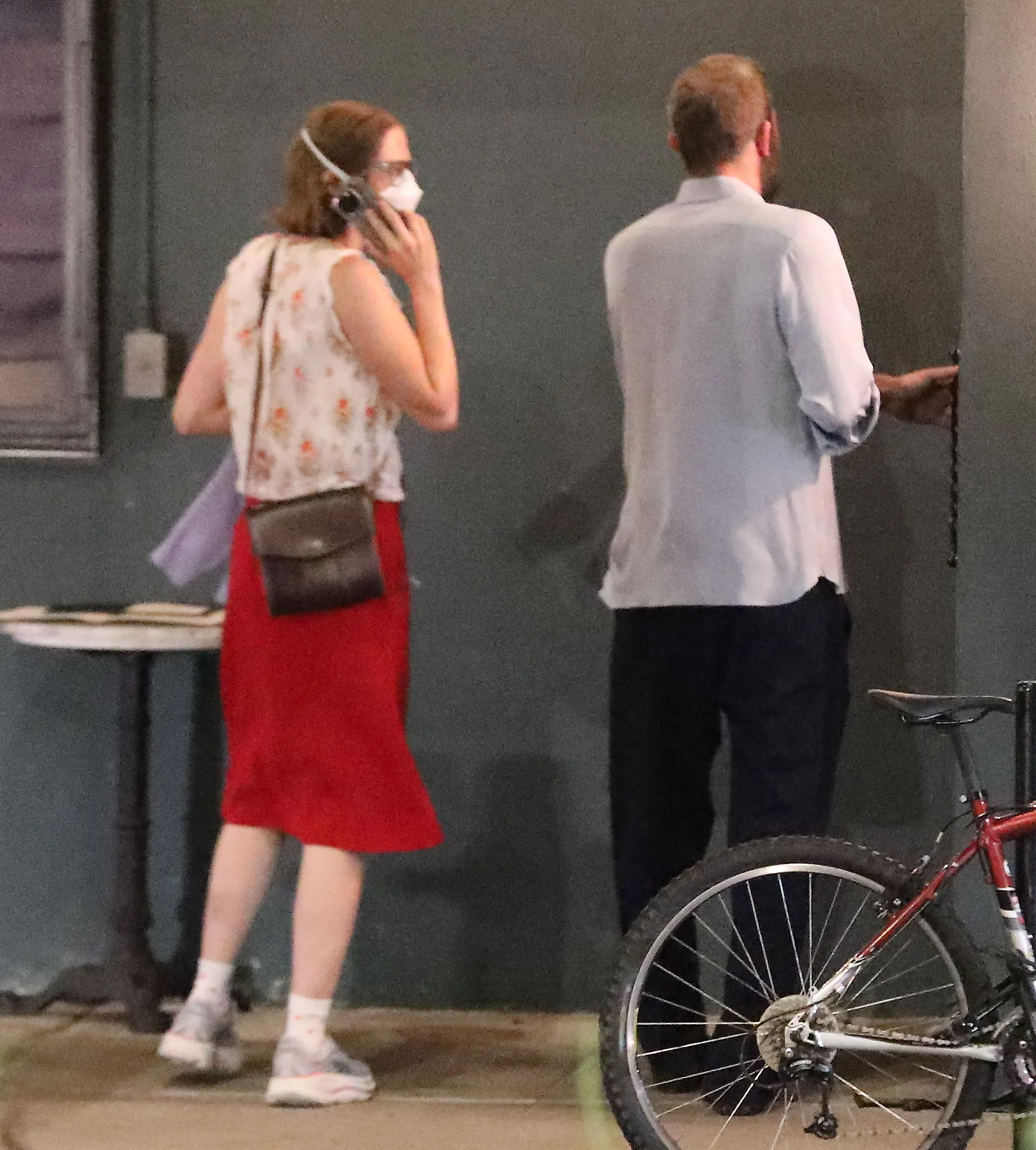 Ben Affleck entering FIA restaurant with his daughter Violet, who is wearing a mask.