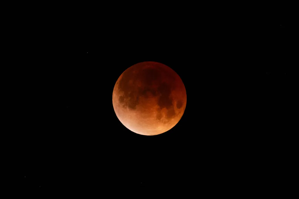 A blood-red moon during a lunar eclipse.