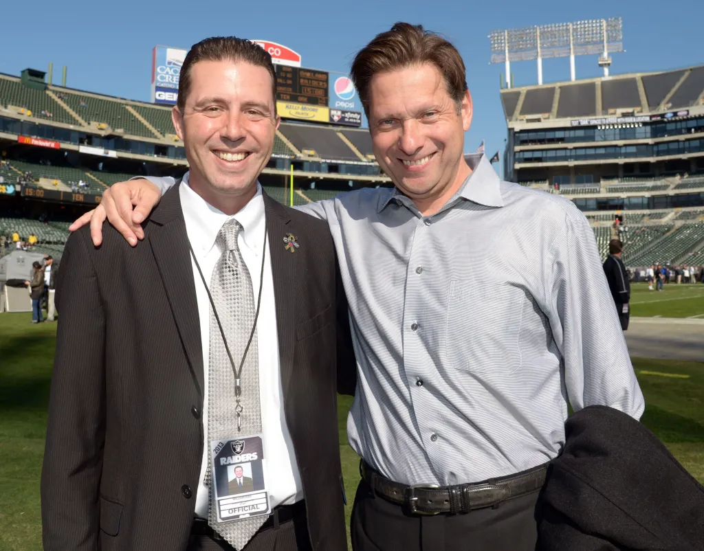 Will Kiss and broadcaster Greg Papa at an NFL game.