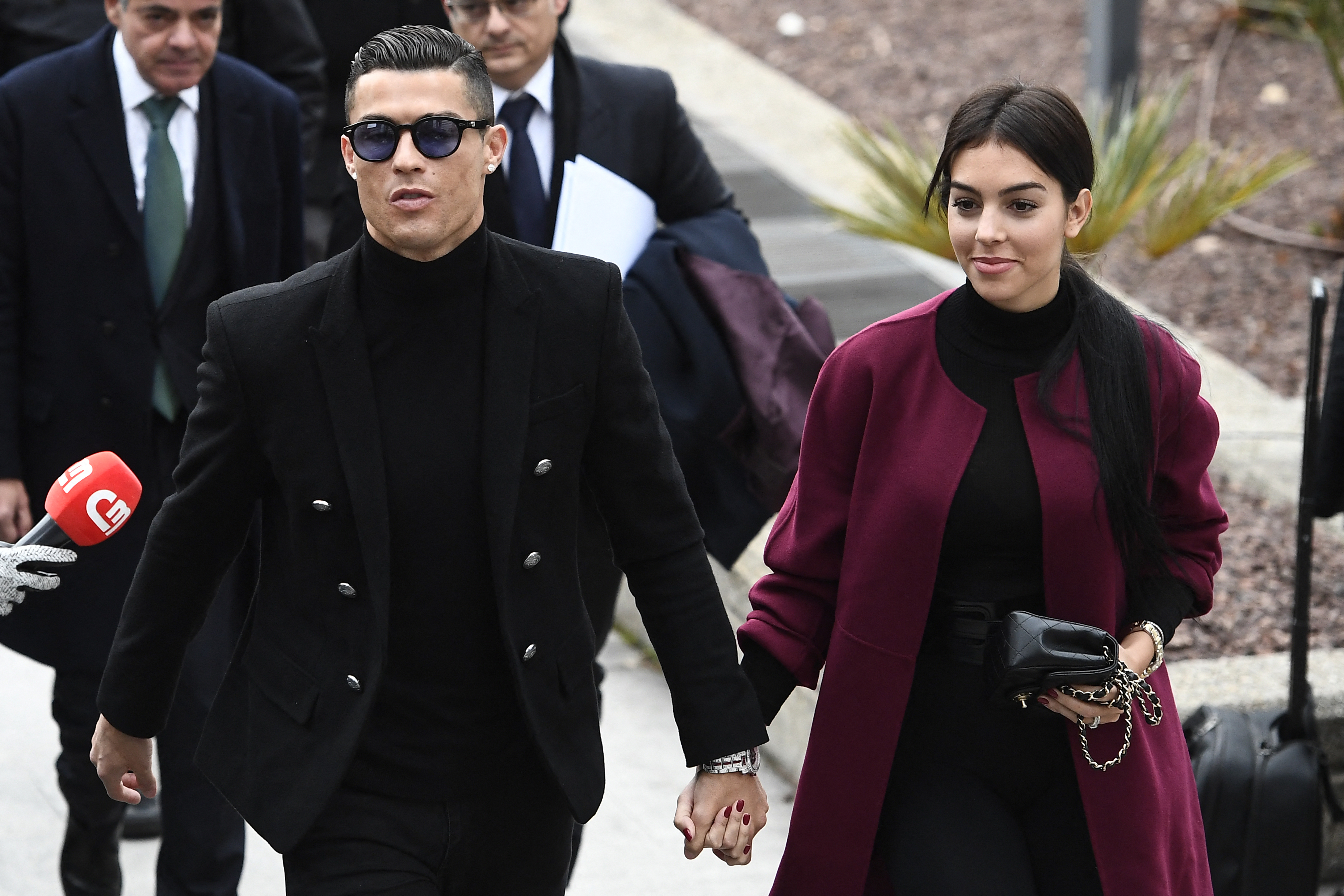 Footballer Cristiano Ronaldo holding hands with his partner Georgina Rodriguez.