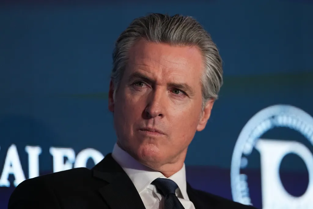 Gavin Newsom, governor of California, looks to the right during a conference.