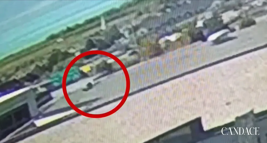 Security footage showing an object on the ground, circled in red, with the word 