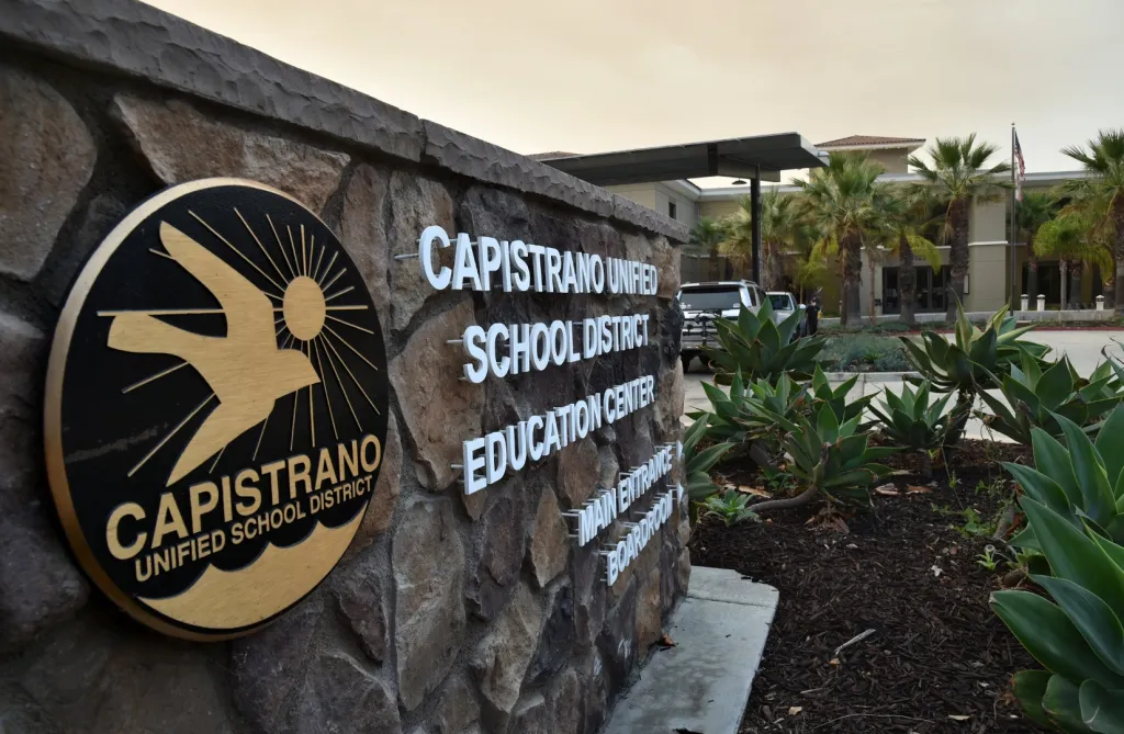 A stone sign for Capistrano Unified School District Education Center.