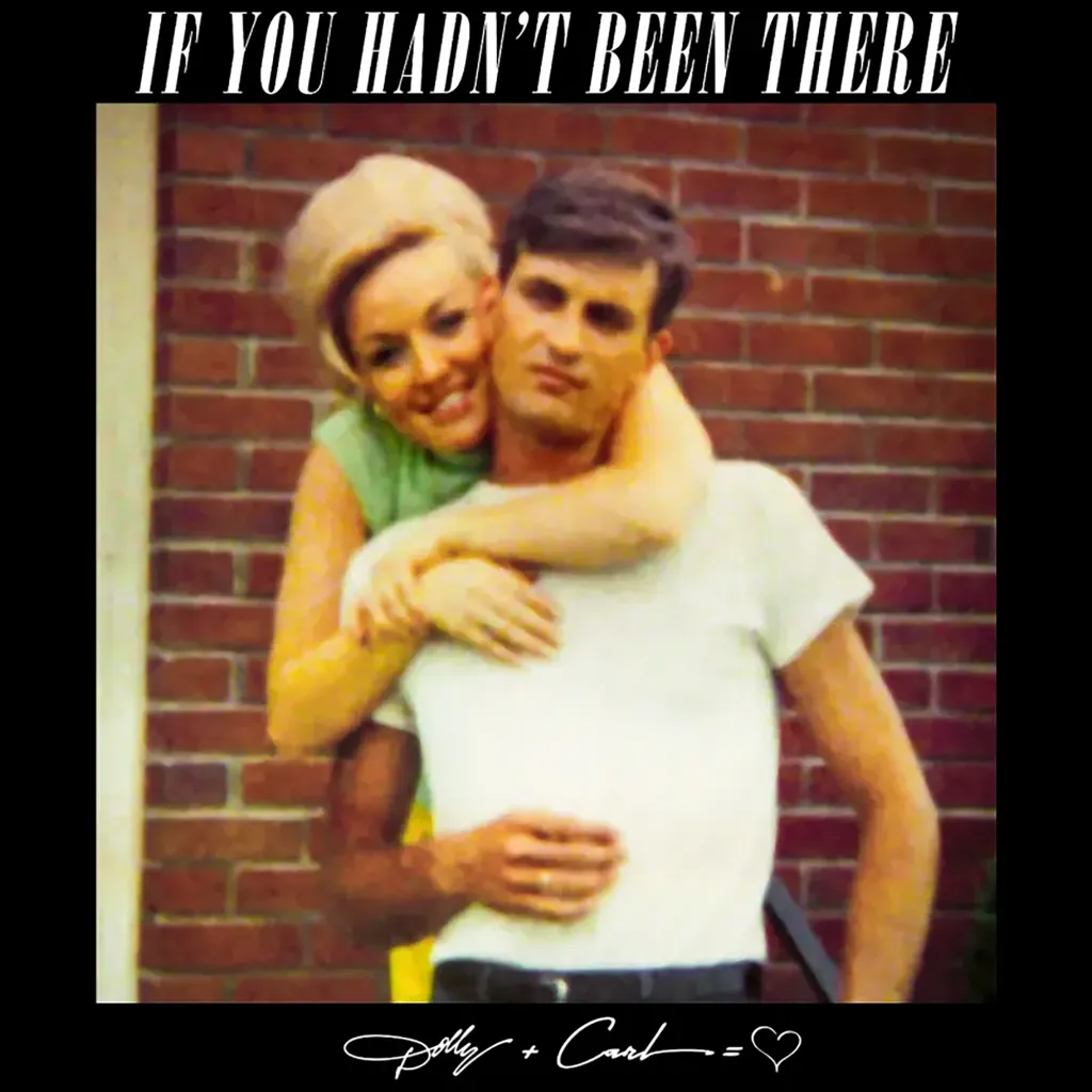 Dolly Parton embracing Carl Dean from behind.