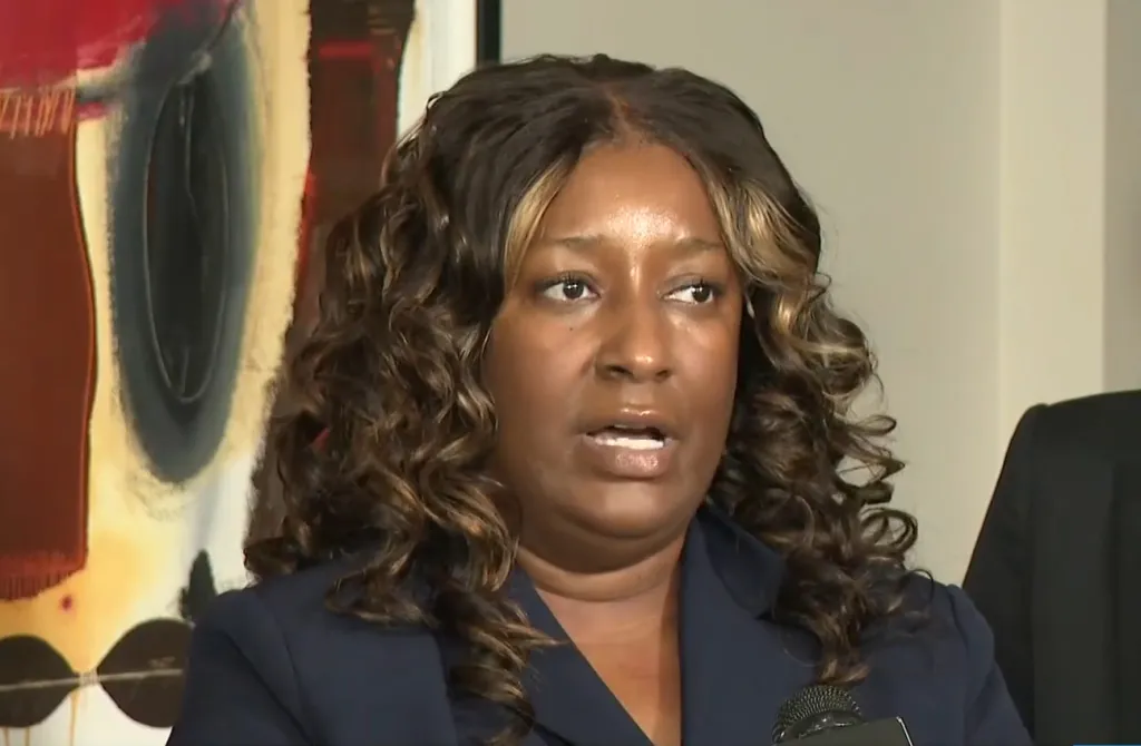 Cassandra Barksdale, who was wrongly diagnosed with endometrial uterine cancer, speaking at a press conference.