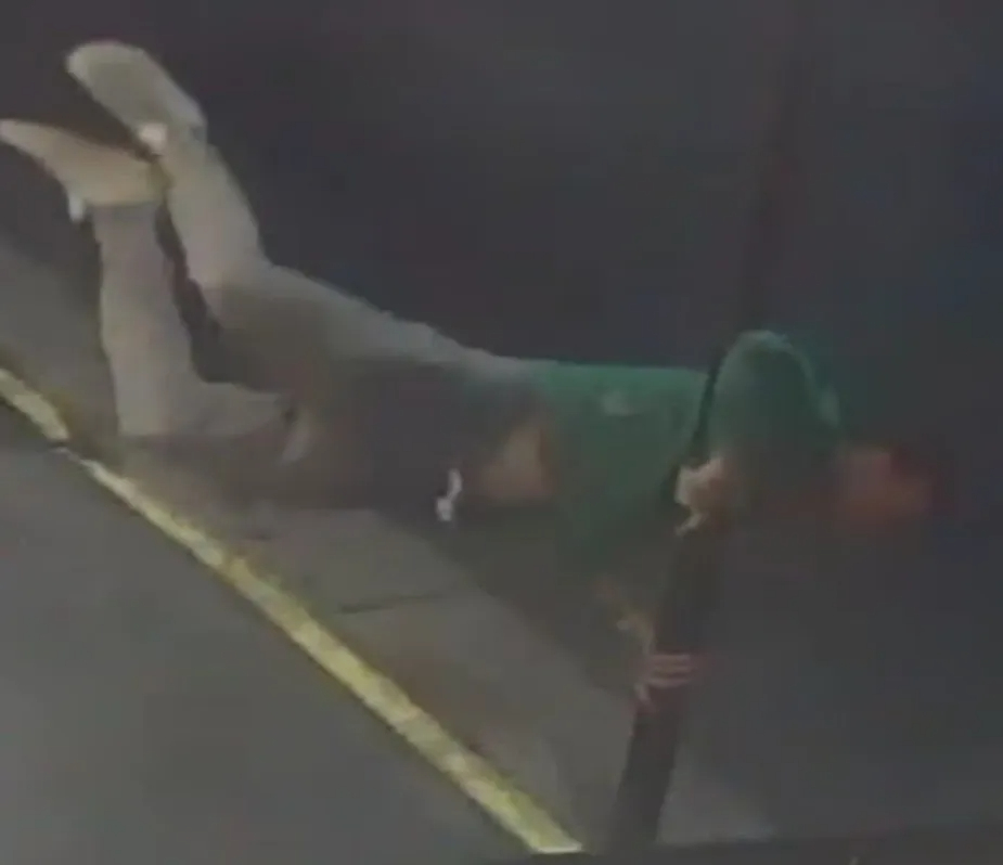 CCTV footage shows Liam Payne lying on the floor of a hotel room, clutching a pole.