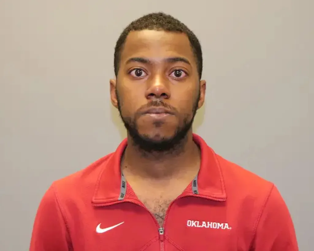 Mugshot of Keyshun Jones in a red Oklahoma athletic jacket.