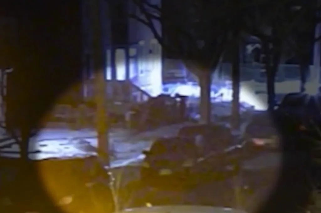 Christian Castro, 52, is pictured in a video of the incident that led to him being jailed and charged with four counts of second-degree assault with a dangerous weapon and one count of falsely reporting a crime in connection with a shooting that wounded Julio Sosa-Celis in north Minneapolis.