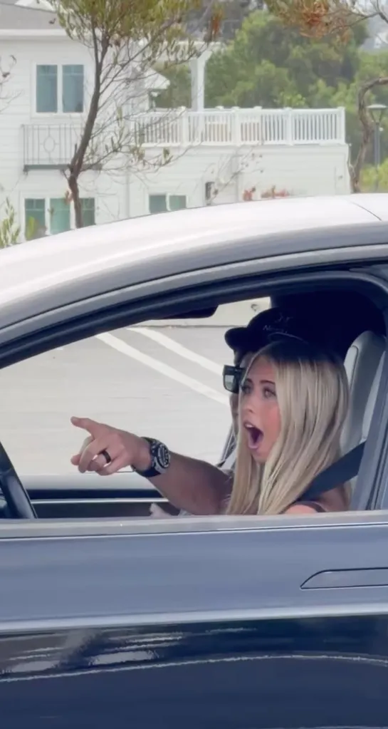 Christina Haack and Tarek El Moussa in a car, with Christina looking surprised.