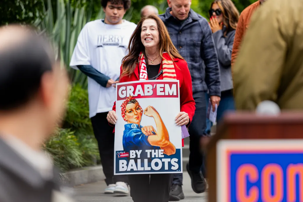 Christine Pelosi carrying a 