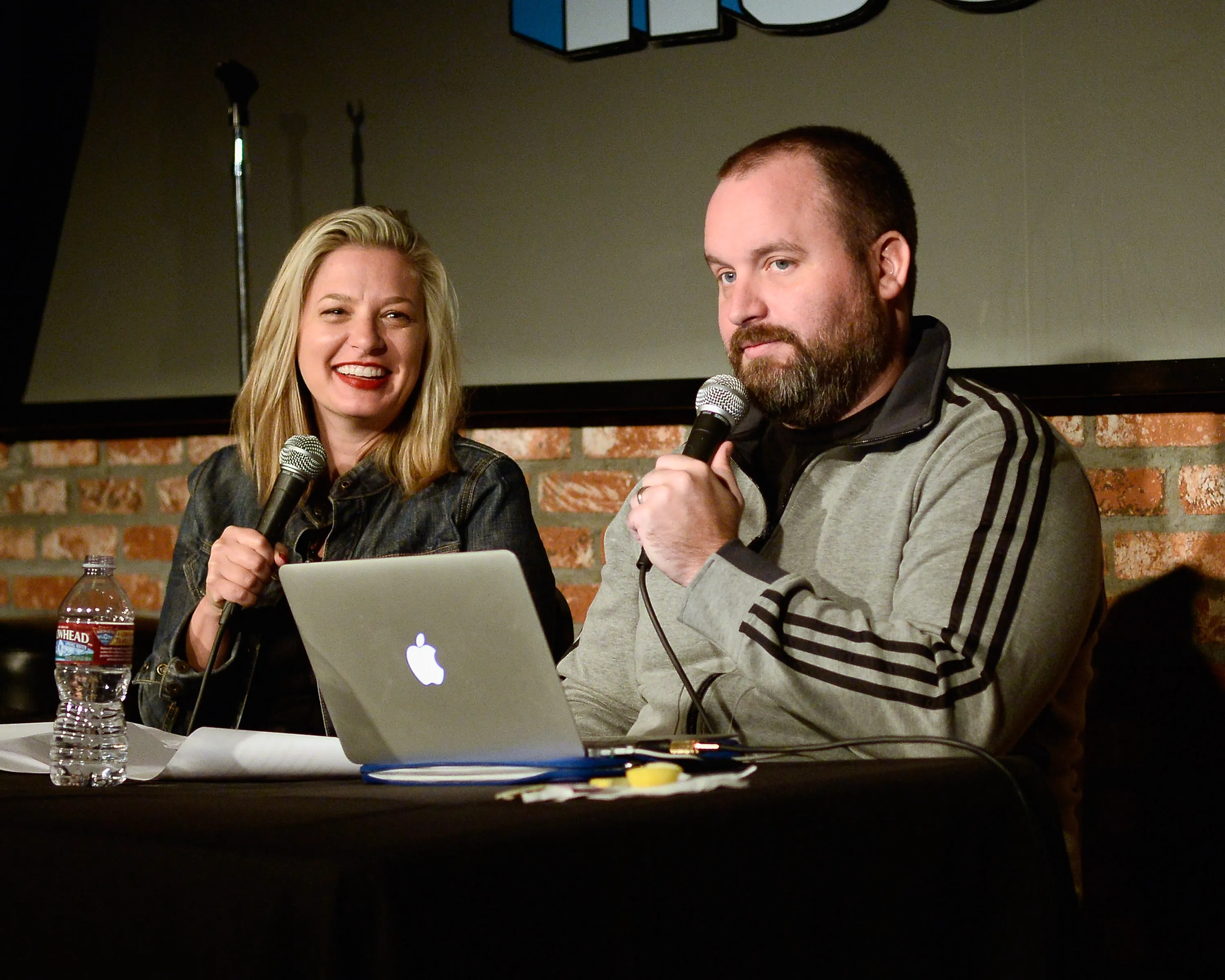 Comedian Christina Pazsitzky and comedian Tom Segura doing the 