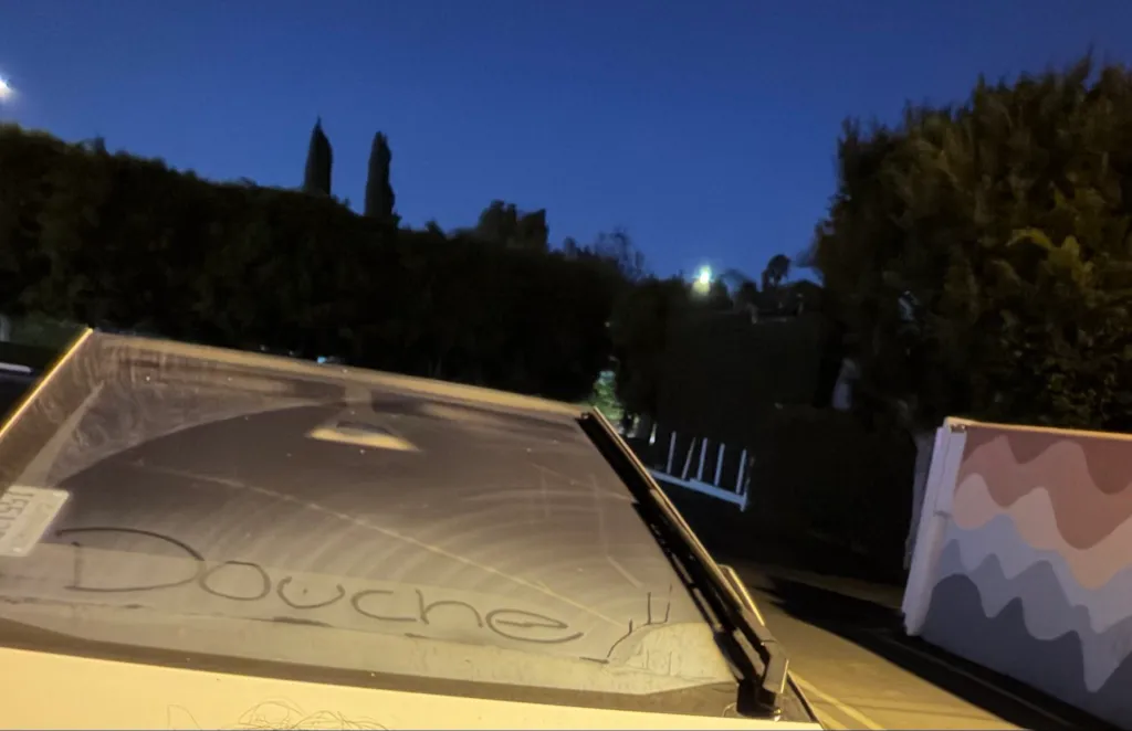 A Tesla windshield has the word 