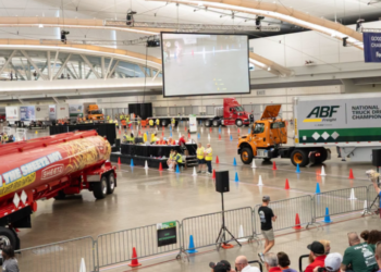 At the ‘Super Bowl of trucking,’ a driver who trained 14 years wins the golden belt buckle