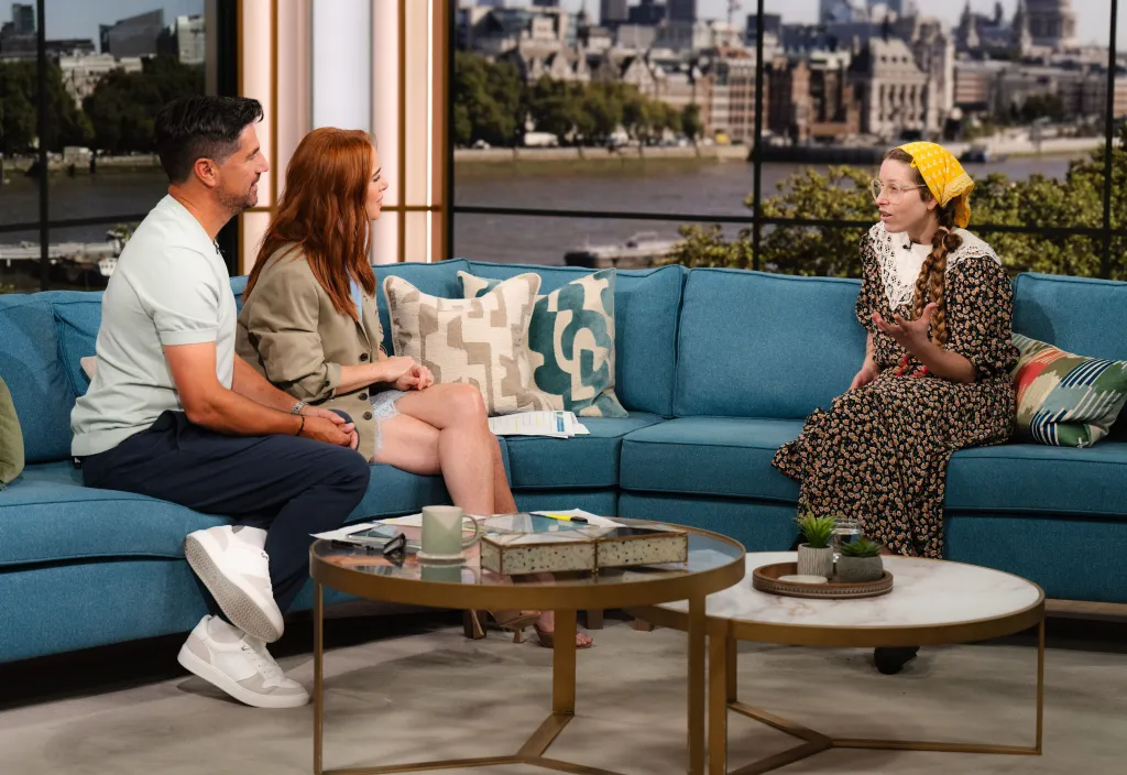 Craig Doyle, Angela Scanlon, and Jessie Cave on the set of 'This Morning' TV show.