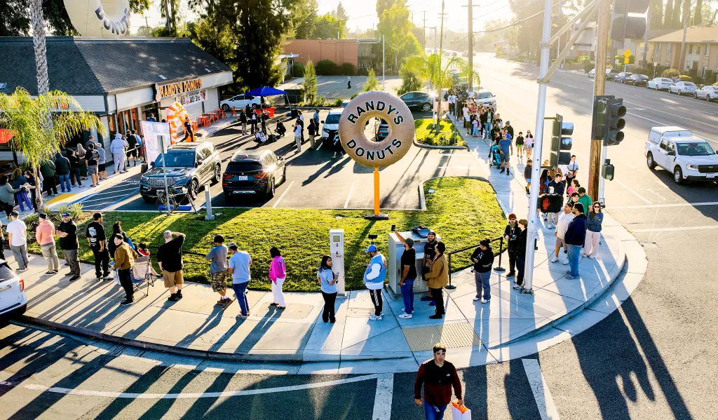 Customers line up for the grand opening of Randy's Donuts in Santa Clara, California.