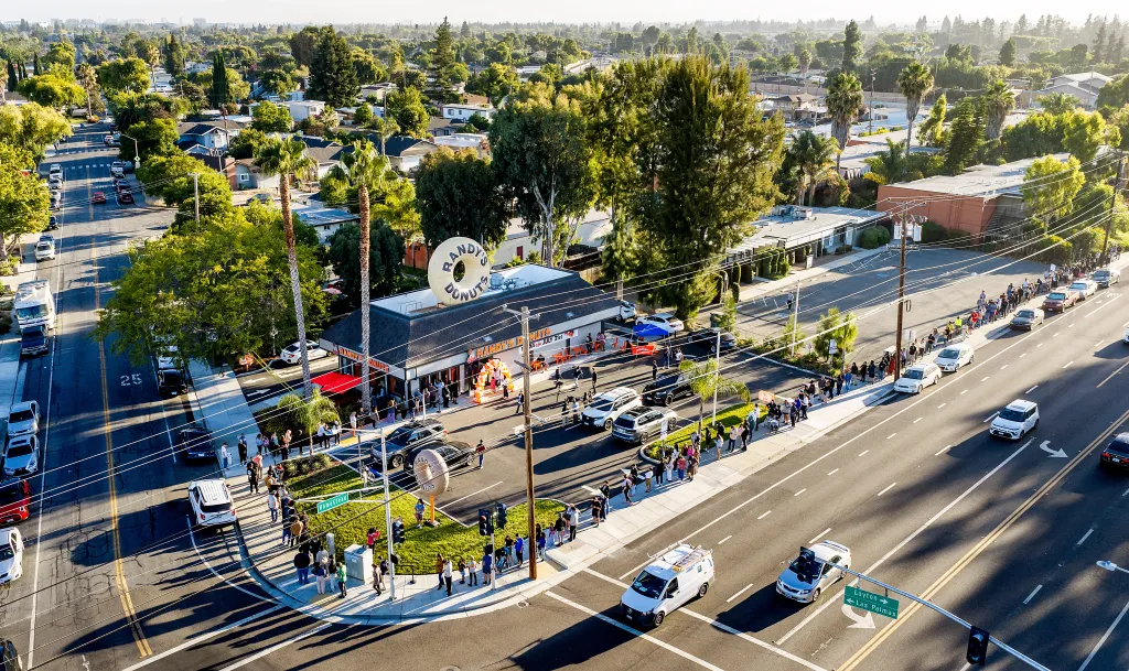 Aerial view of customers lined up outside Randy's Donuts in Santa Clara, California.