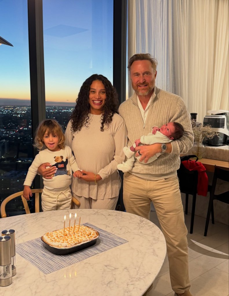 David Guetta, his partner, and two children pose for a family photo.