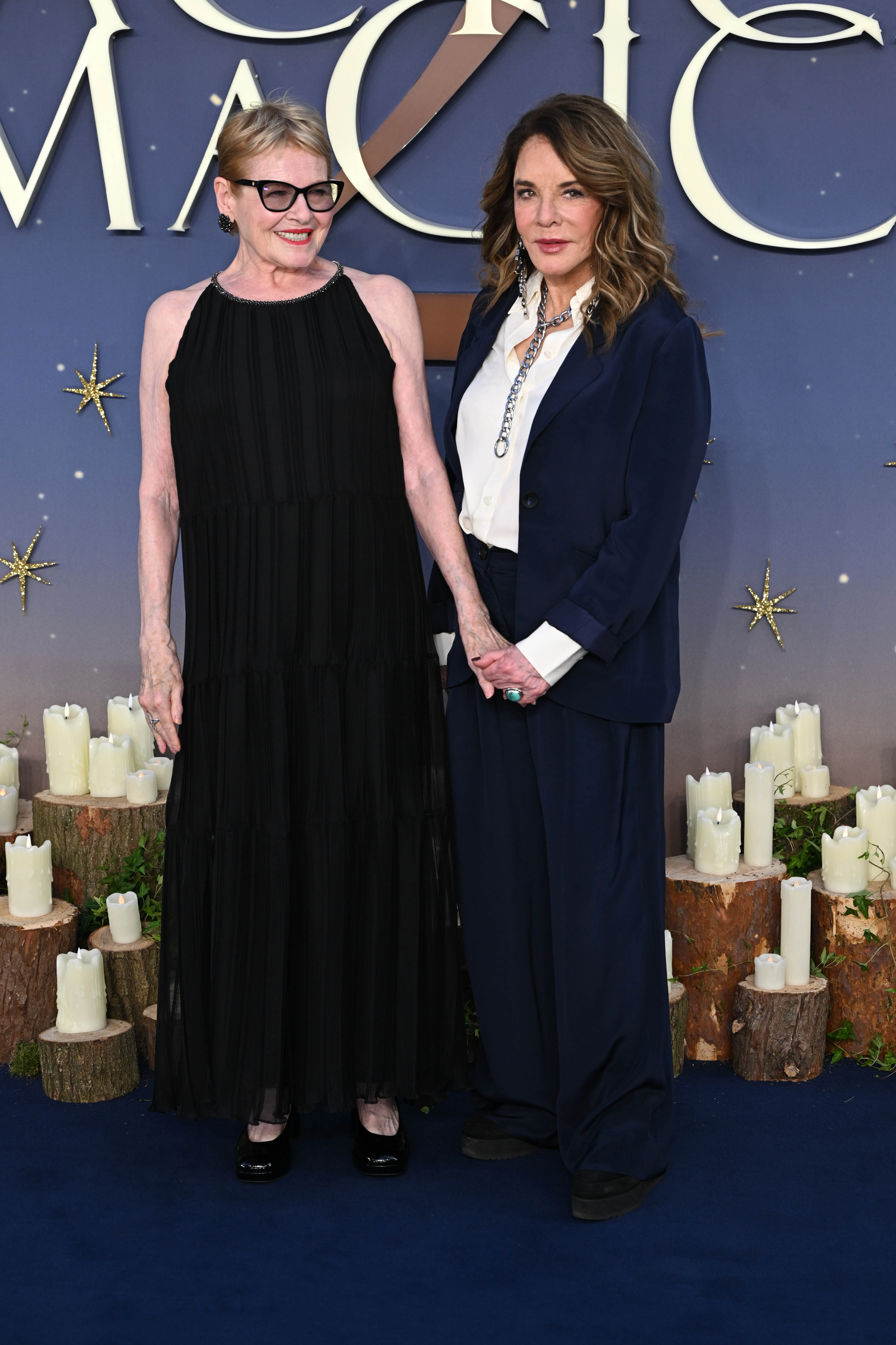Dianne Wiest and Stockard Channing smile while posing together at the