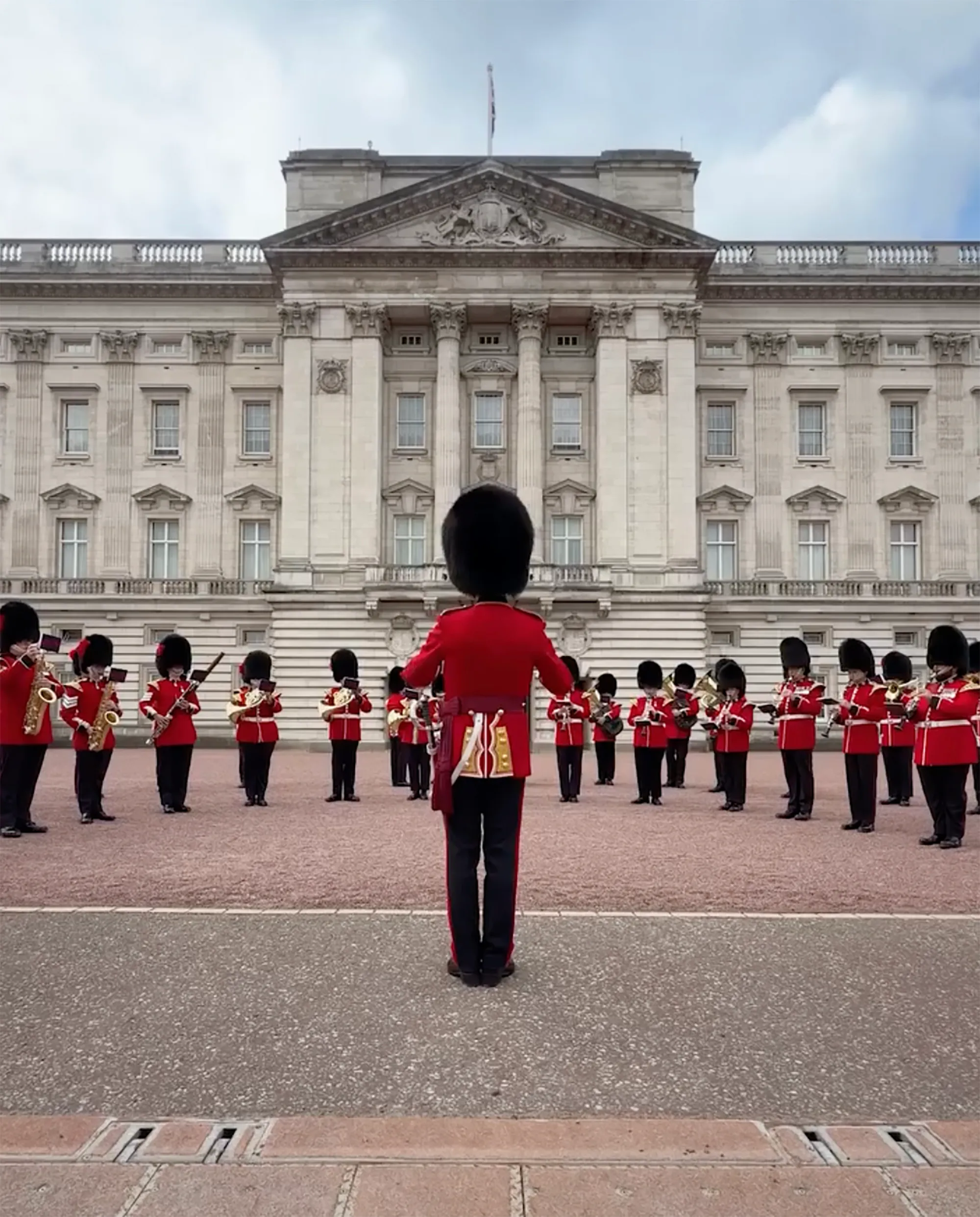 The Coldstream Guards Band performing in front of Buckingham Palace, celebrating Dolly Parton.