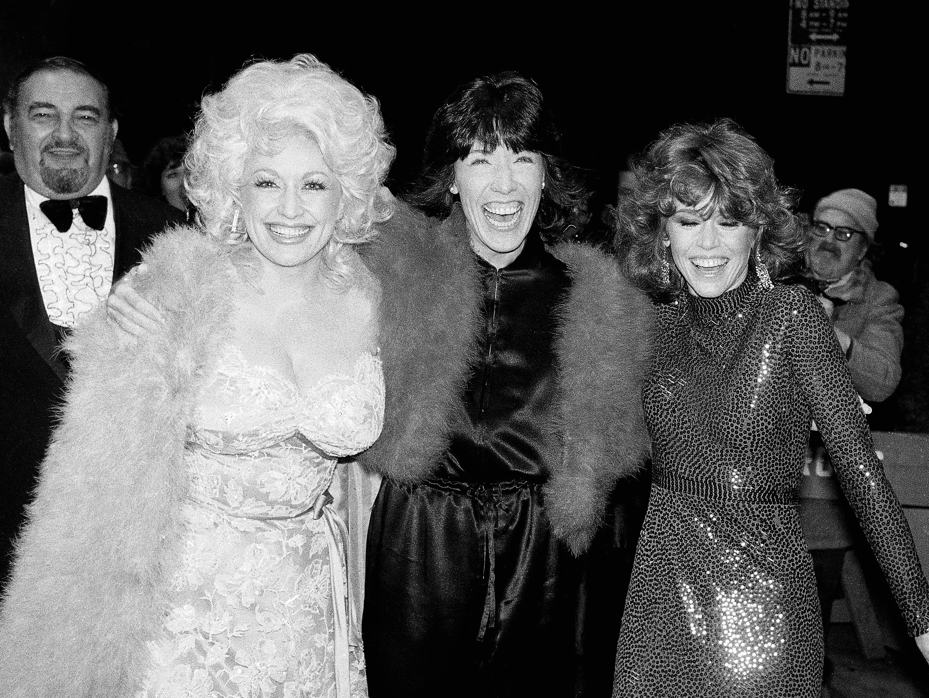 Dolly Parton, left, Lily Tomlin, center, and Jan Fonda arrive for the premiere of their film