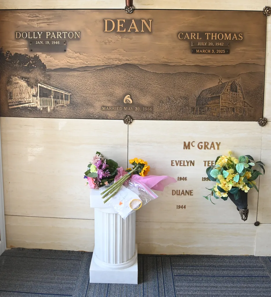 Dolly Parton's burial site with flowers at Woodlawn-Roesch-Patton Funeral Home & Woodlawn Memorial Park.