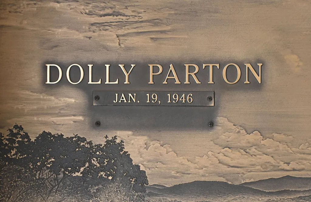 Dolly Parton's gravestone with her name and birthdate, Jan. 19, 1946, engraved.