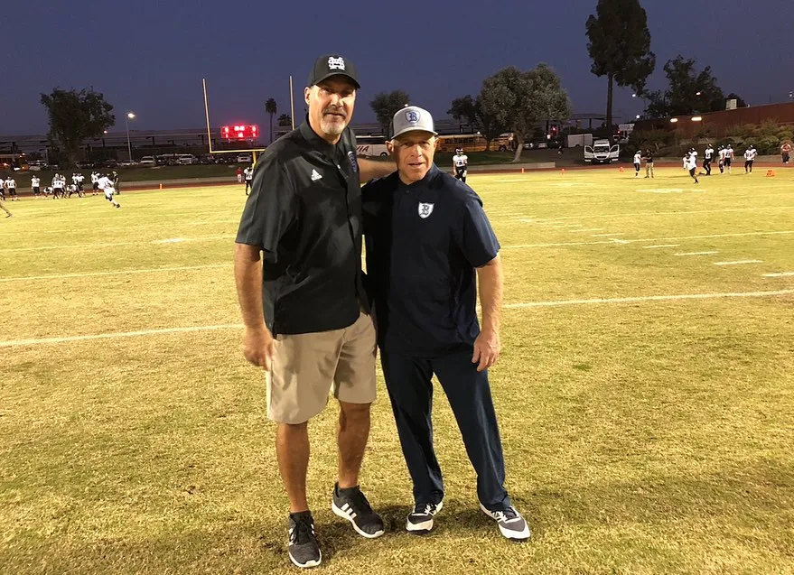 Don Arax, a former Bullard High School teacher and coach, is pictured on the right on a football field.