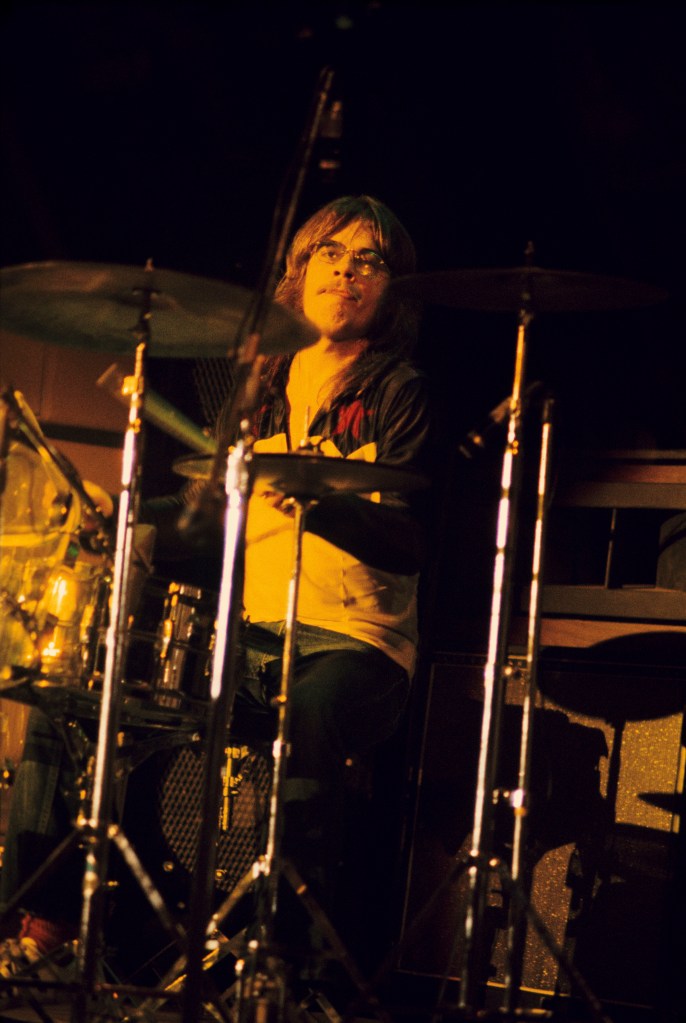 Frank Beard, drummer for ZZ Top, performs on stage.