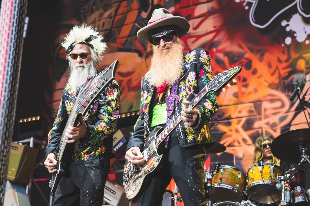 Elwood Francis and Billy Gibbons of ZZ Top perform on stage.