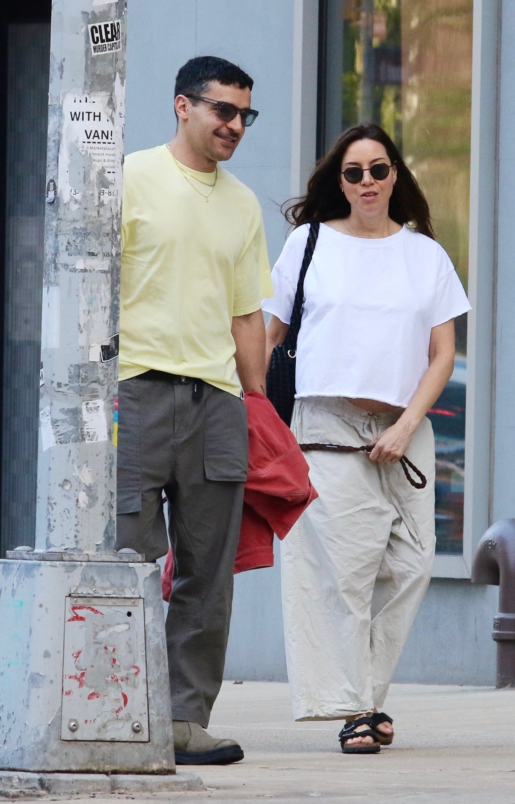 Aubrey Plaza shows off her baby bump with Christopher Abbott.