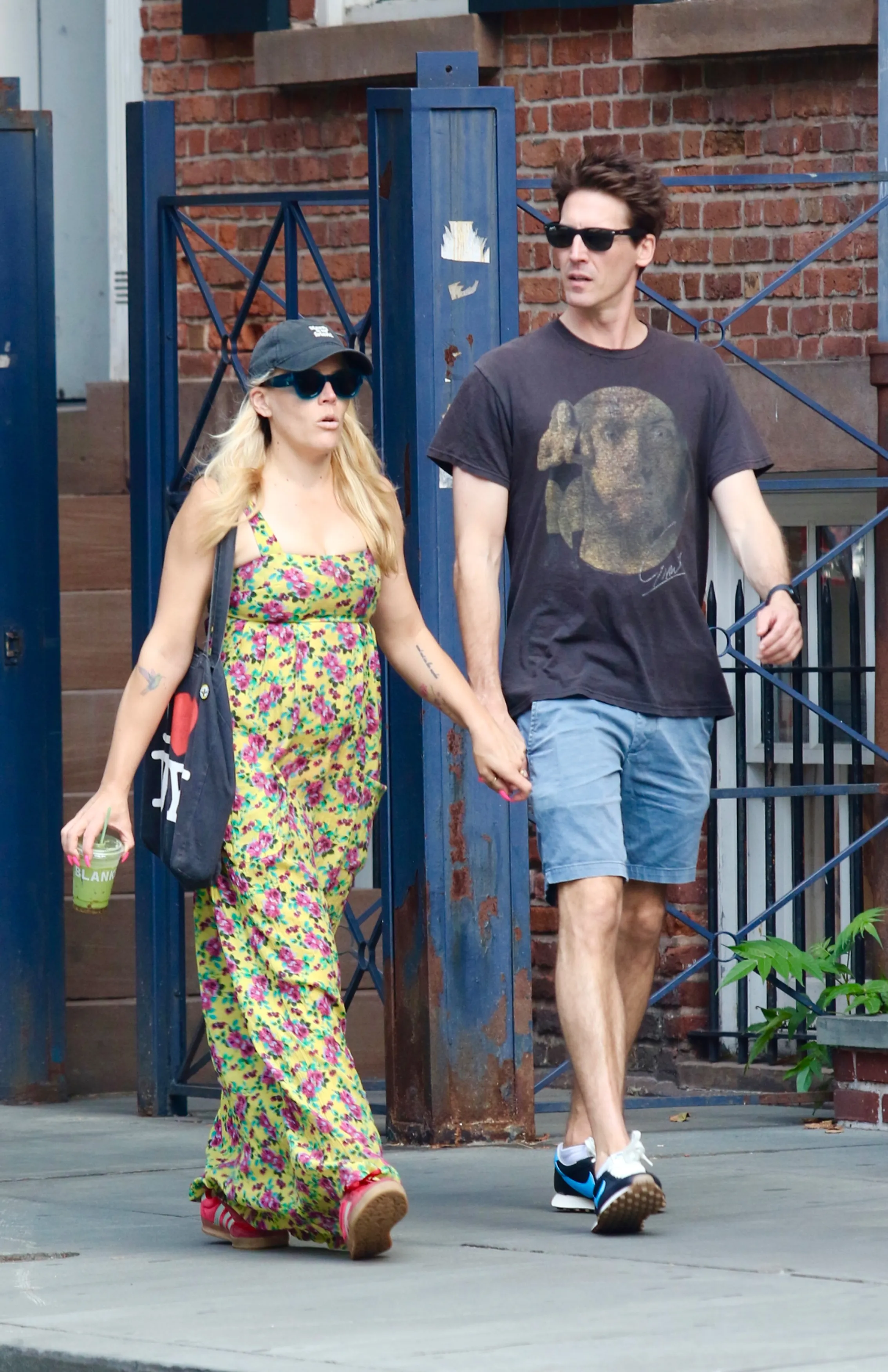Busy Philipps and Blake Berris walking hand-in-hand in New York City.