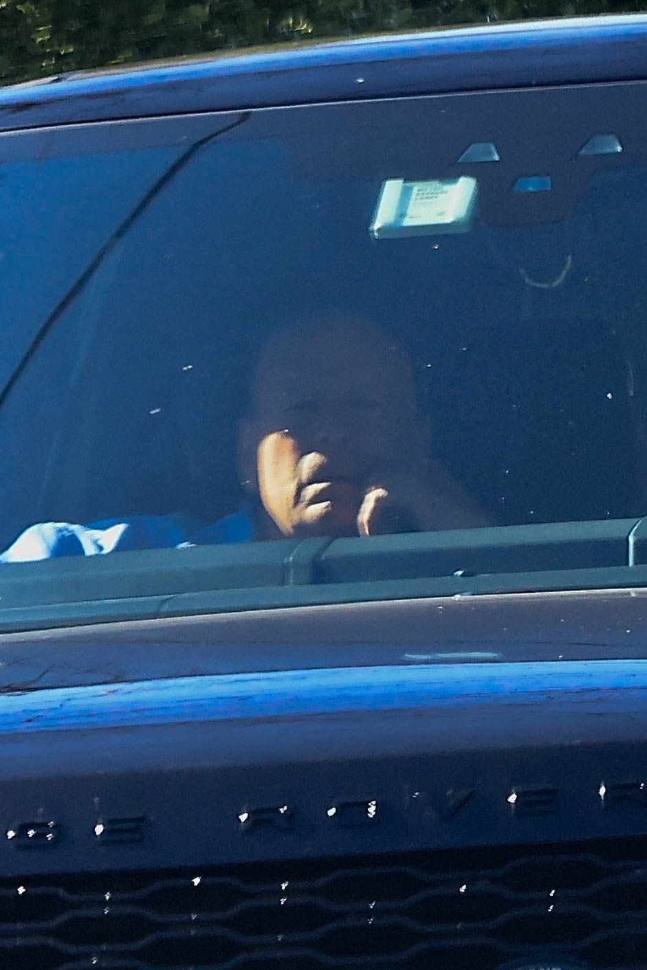 Bruce Willis sits in the passenger seat of a car in Studio City.