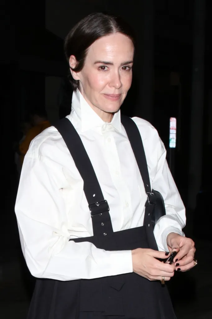 Actress Sarah Paulson leaving Craig's restaurant, wearing a white collared blouse and black pinafore skirt.