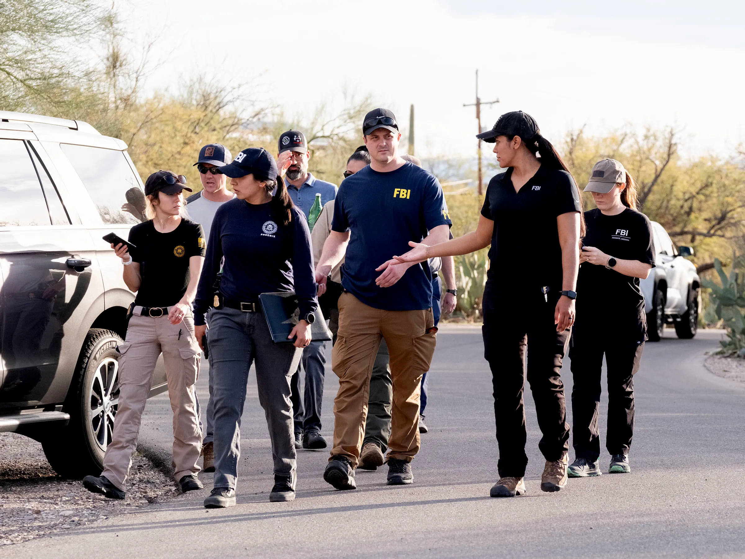 FBI agents going door to door in Annie Guthrie's neighborhood during the search for Nancy Guthrie.