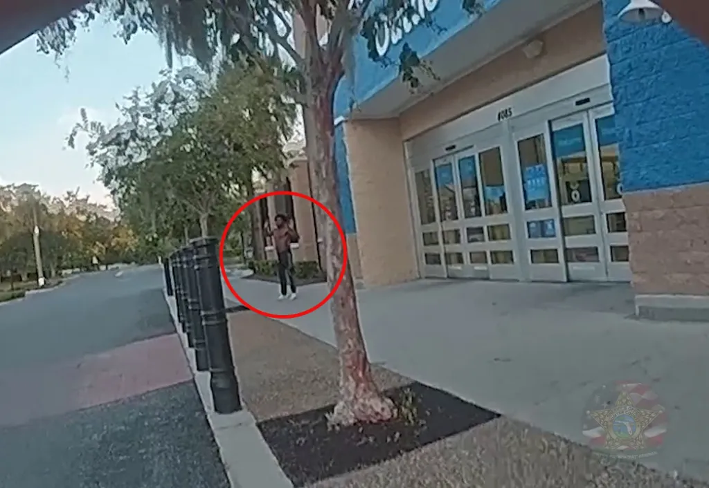 Qahiem Williams, identified by a red circle, flees on foot from a Florida traffic stop.