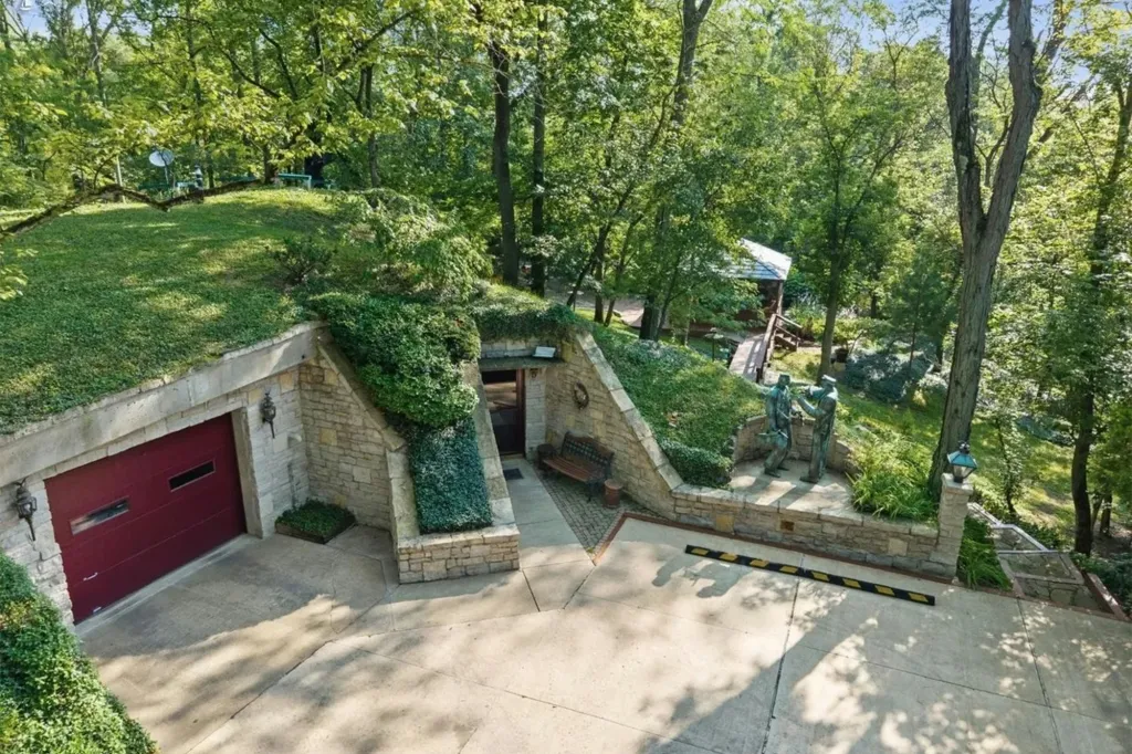 An earth-sheltered home built almost entirely underground with a dirt- and grass-covered roof in Huron, Ohio.