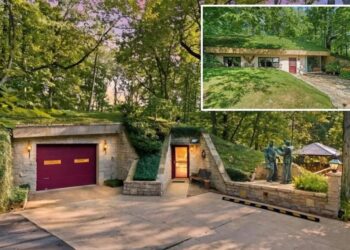 Earth-sheltered Ohio home that is built almost entirely underground comes with a roof you have to mow