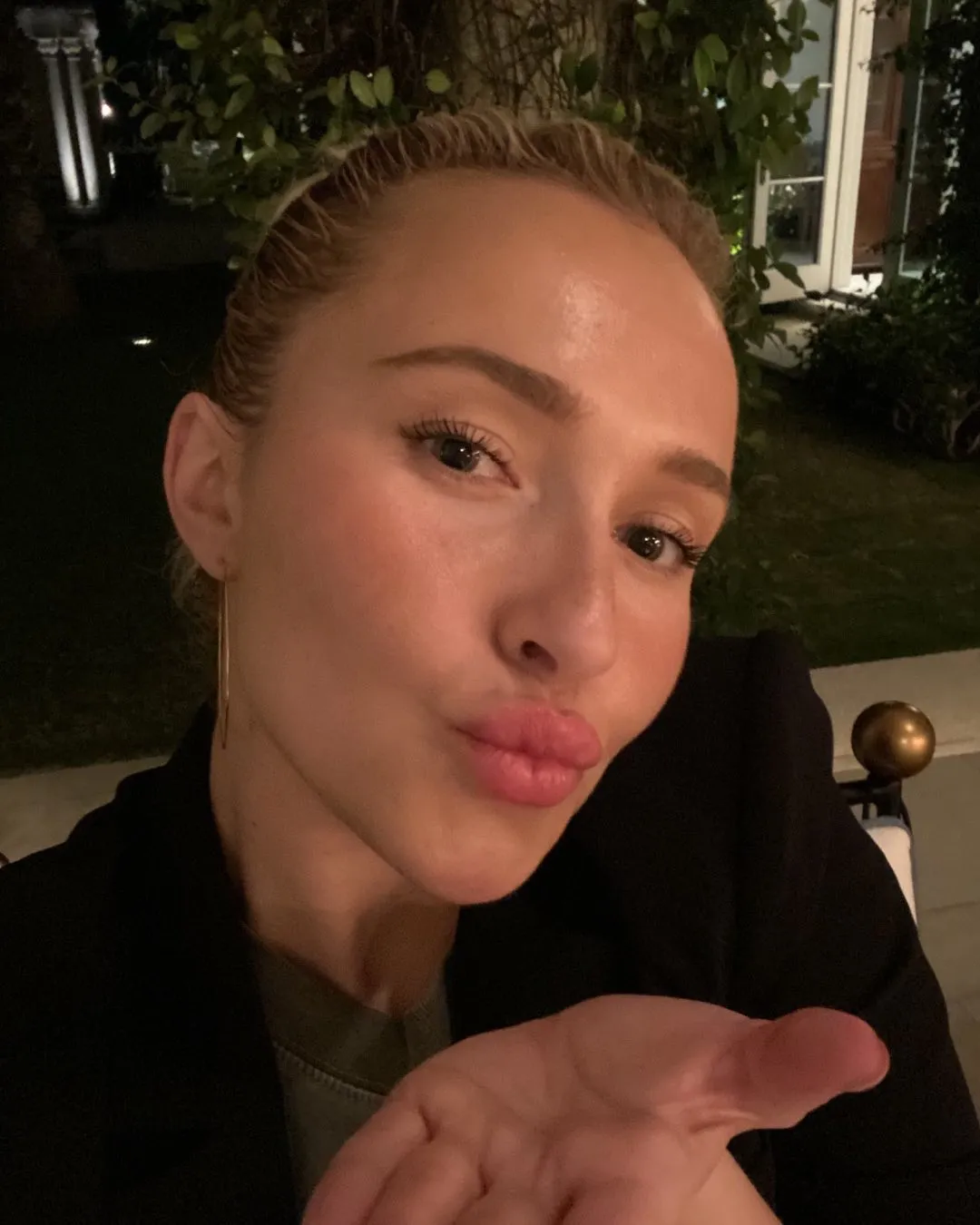 Hayden Panettiere blowing a kiss to the camera.