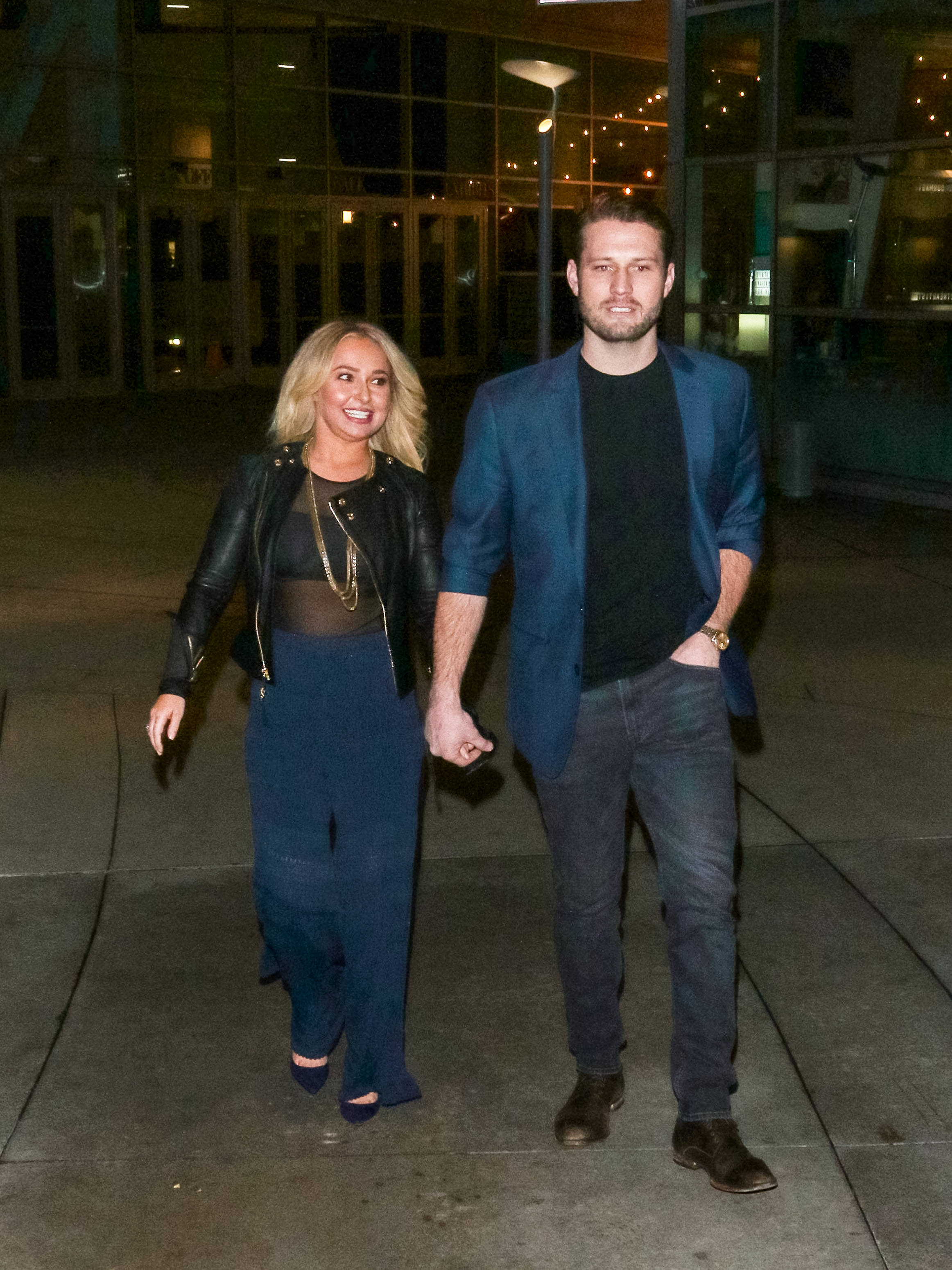 Hayden Panettiere and Brian Hickerson walking hand-in-hand.