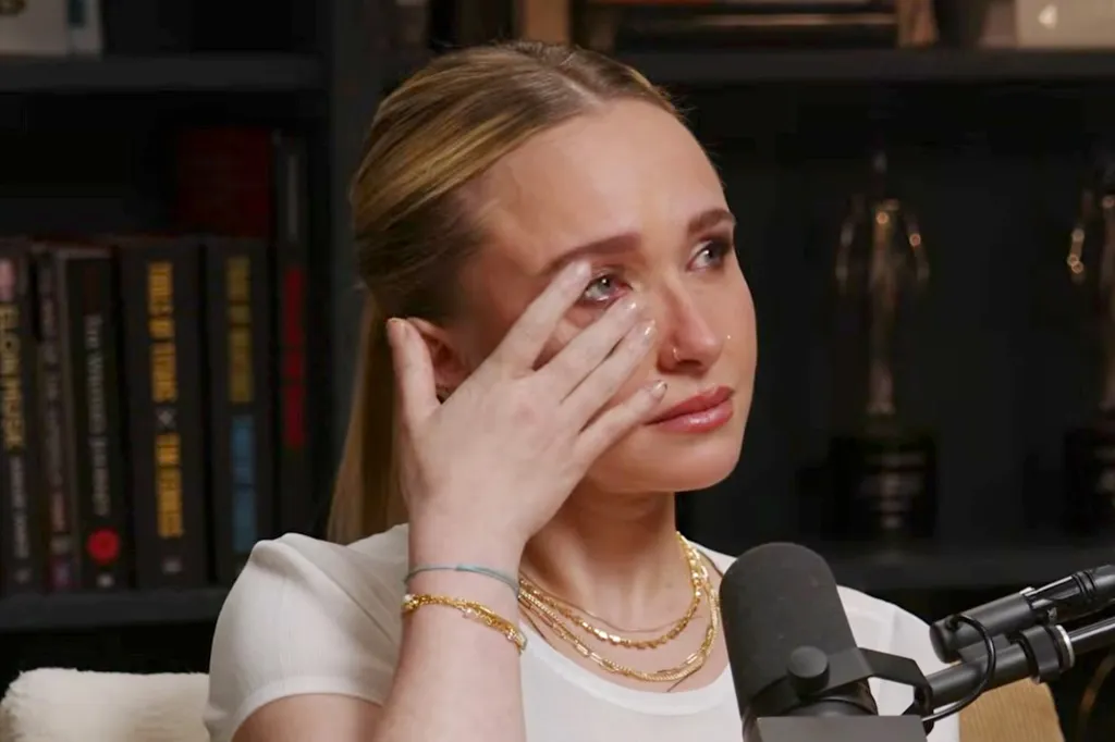 Hayden Panettiere in an interview with Jay Shetty, wiping away tears.