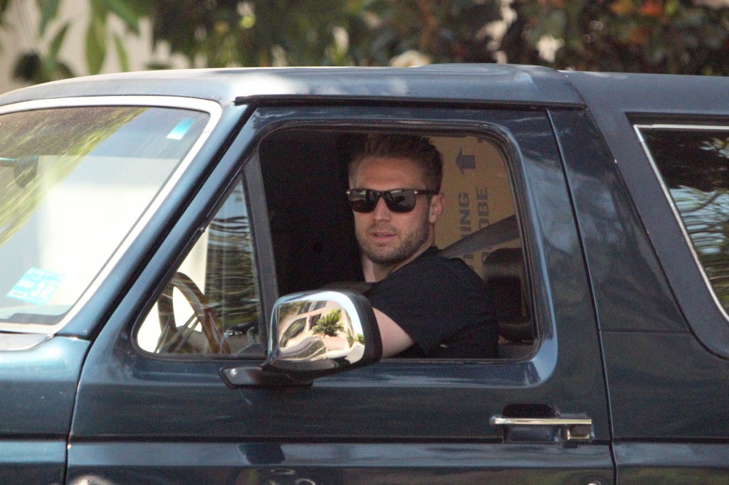 Brian Hickerson driving a Bronco.