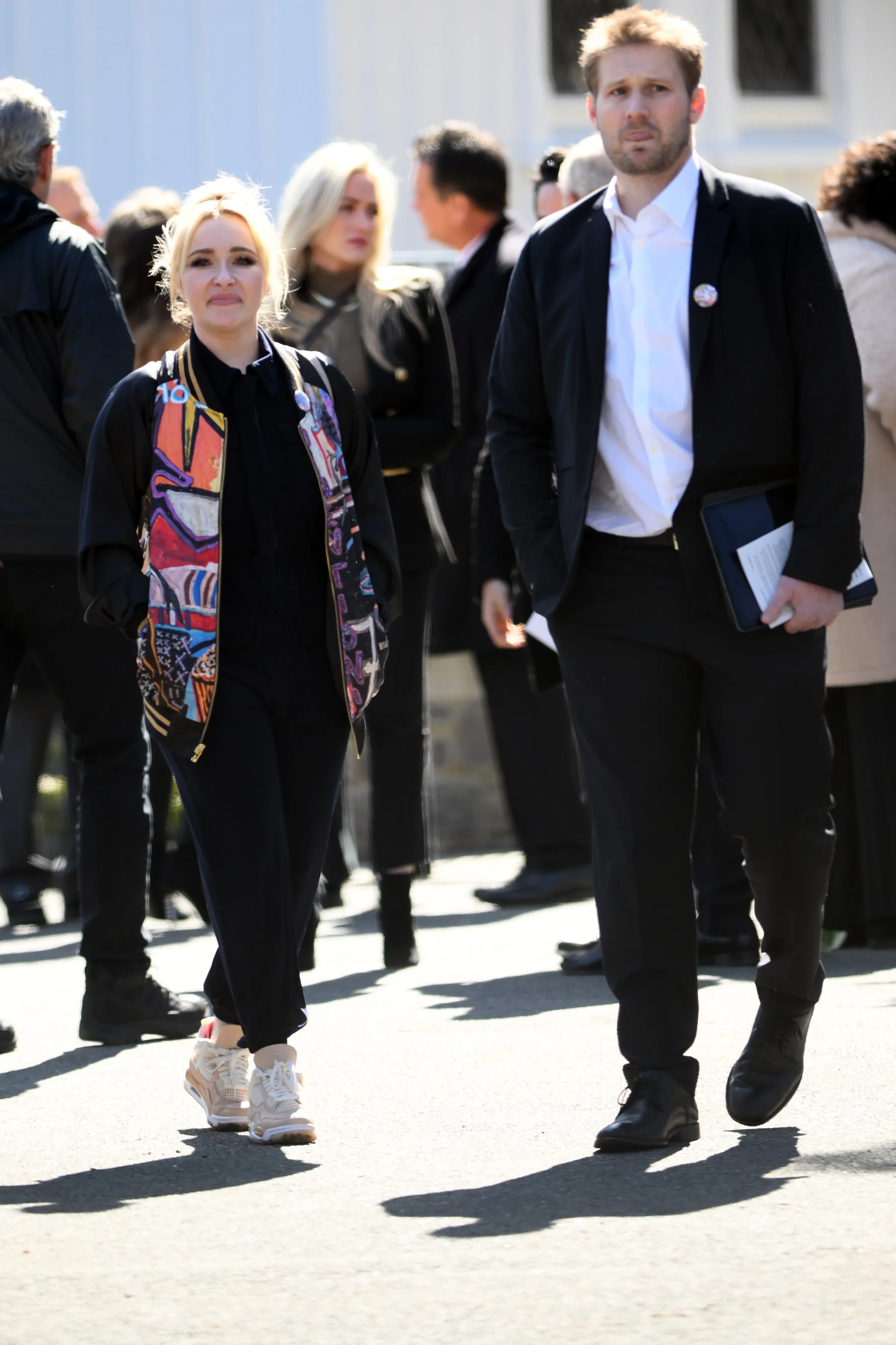 Hayden Panettiere wearing her late brother's painted jacket, walking with Brian Hickerson at his celebration of life.