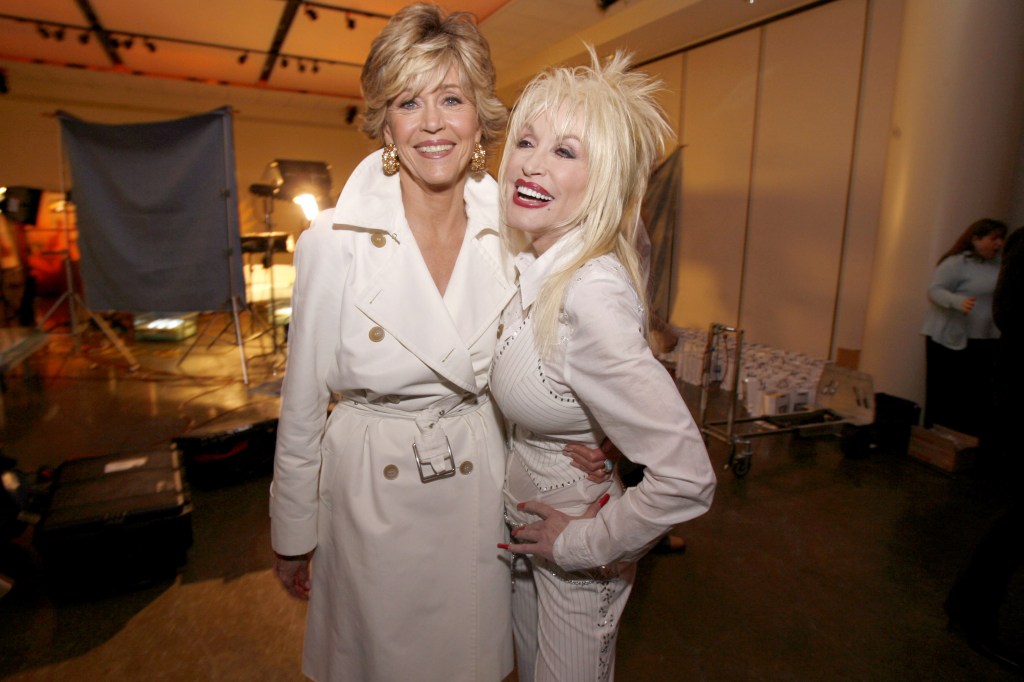 Jane Fonda and Dolly Parton smiling at the 9 to 5 25th Anniversary Special Edition DVD Launch Party.
