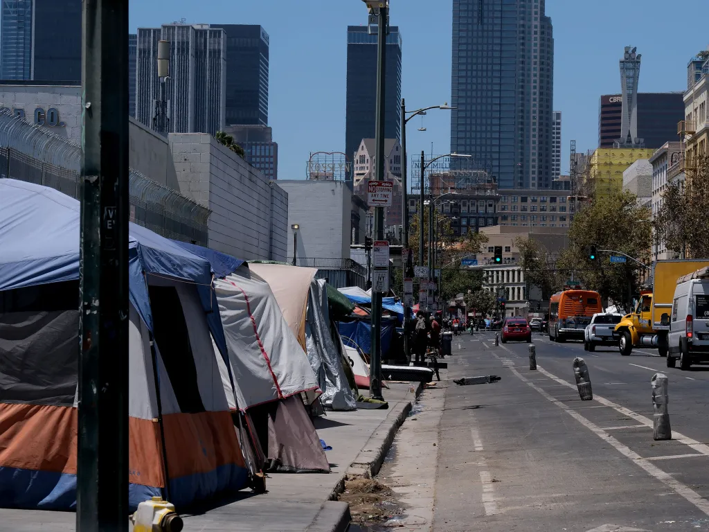 Tents line a street in downtown Los Angeles, indicating a rising number of homeless figures.
